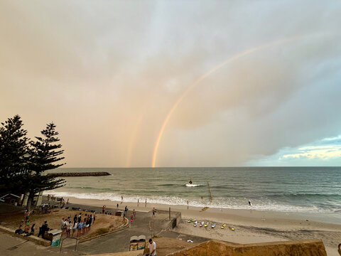 Rainbow Over Cottesloe Beach Perth Western Australia After Storm Partly Cloudy Coastal Scene