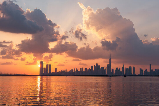 amazing sunset view of Dubai Downtown cityline from Dubai Creek harbour