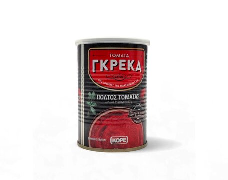 Photo of Kyknos Greek tomato paste (Tomata Greka), a premium tomato product made from tomatoes grown in the fertile plains of Serres, Greece.