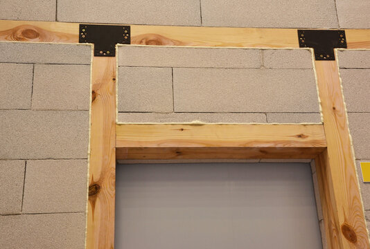 Door frame installation aerated concrete wall timber lintel insulation foam construction
