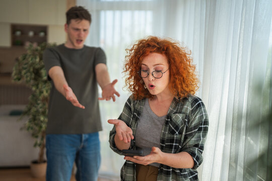 Couple having conflict argument over communication issues at home