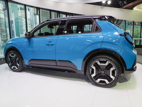 TOKYO, JAPAN - April 29, 2026: A Nissan Micra on display in the Ginza Place Nissan Crossing showroom.