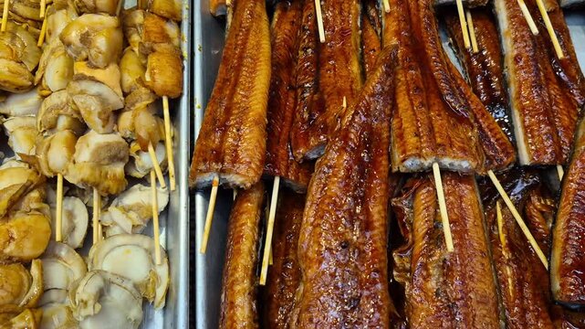 japanese fish market ready to eat scallop and eel skewer bbq Japan quality seafood