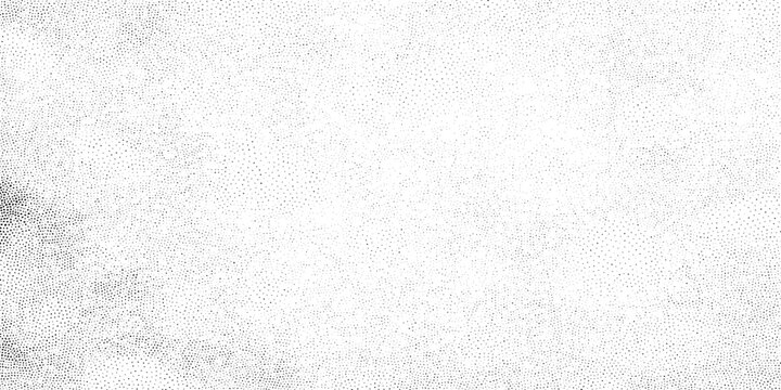 Halftone dot pattern texture background with gradient effect in black and white for design and artistic use