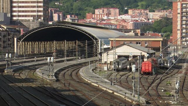 Urban railway tracks leading to abando train station in bilbao
