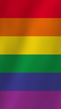 Waving LGBTQ pride rainbow flag seamless loop background for Pride Month.