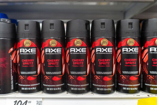 Villa de Alvarez, Colima. April 14, 2026: Multiple Cans of Cherry Spritz Axe Fine Fragrance Bodyspray Deodorant Lined Up on a Shelf