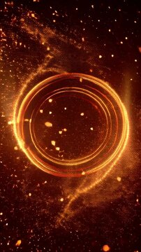 Glowing orange circle radiates sparks in dark space with vibrant light effects.