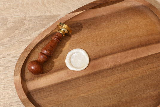 Vintage wax stamp in a Wooden tray