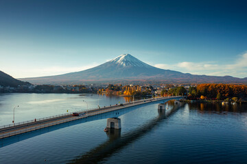 Aerial view by drone of Mount Fuji and bridge at Kawaguchi lake, Japan on morning © FocusStocker