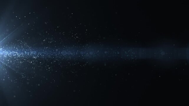 Subtle white particle stream emerging from light source on dark background, abstract cinematic motion with depth, glow, and floating dust energy