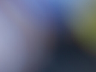 Obraz premium Abstract blurred background featuring smooth gradients of soft blue, deep indigo, and subtle yellow light. Perfect for modern digital designs, presentations, and artistic creative projects.
