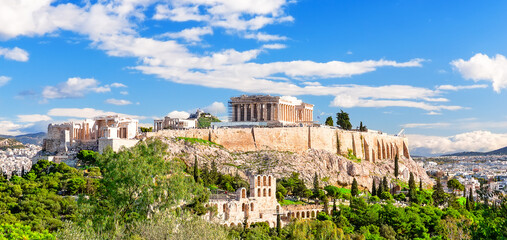 Fototapeta premium The Acropolis of Athens with the Parthenon Temple in sunny day, Greece. View of the ruins of the ancient city of Athens in Greece