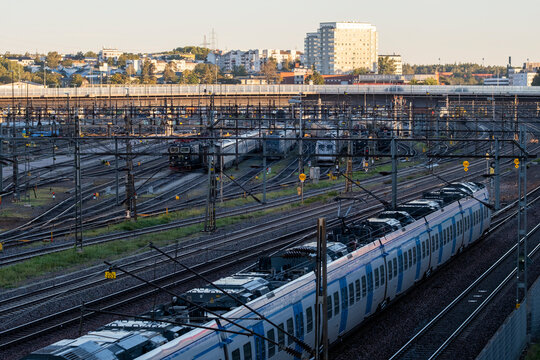Stockholm Sweden commute rides the transit network as train railway tracks form transport infrastructure lines shaping the city rail system