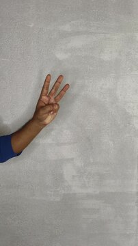 Fingers isolated on white background lifting for counting one, two and three using hand numbers gesture. dactylonomy, signaling, and manual communication concept.
