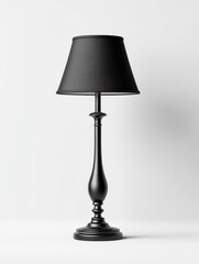 Obraz premium Elegant Black Table Lamp with Patterned Shade on White Background