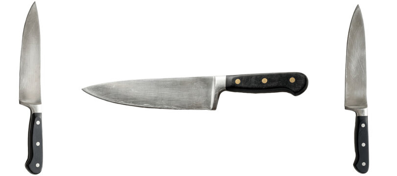 Set of professional chef knives isolated on white background &ndash; sharp stainless steel kitchen cutlery collection with black handles for cooking preparation

