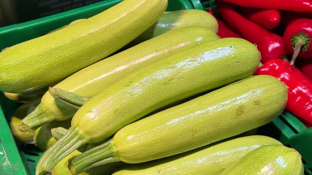 Fresh green zucchini rotating on a turntable.