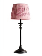 Obraz premium Elegant Pink Beaded Lampshade on Ornate Black Lamp Base Soft Light Illumination