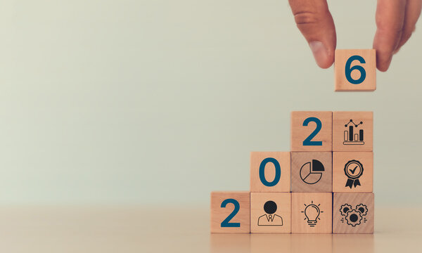 Businessman plan strategy marketing and finance to goal in 2026 planning business growth with technology AI and environmental care to New Year resolutions business.