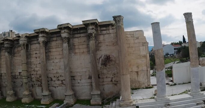 Athens, Greece - Mar 10, 2024: Ancient ruins of Hadrian's Library, a landmark of Athens, Greece, aerial drone shot