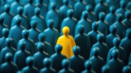 Obraz premium A single yellow figure stands out among a crowd of identical blue figures, symbolizing individuality and uniqueness.