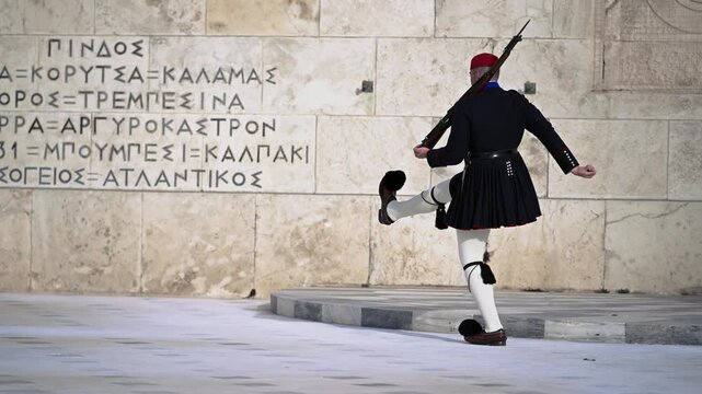 Evzone soldiers at the post near the grave of the unknown soldier in Athens on Syntagmatos Square, the changing of the guard