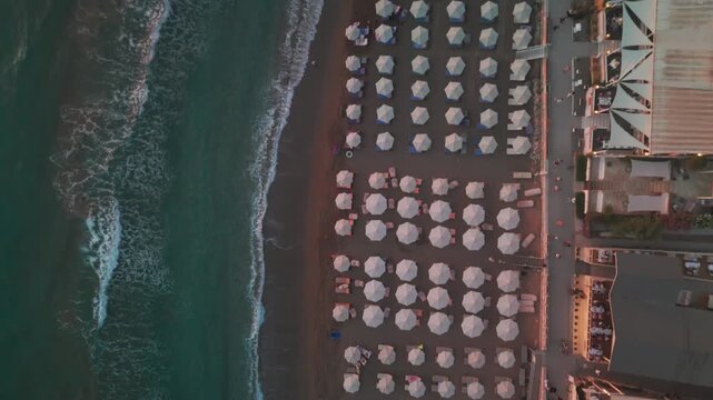 Top Down Vertical Drone Shot of Turquoise Waves and Golden Sand on Agios Gordios Beach Corfu