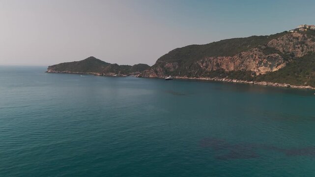 Scenic Drone Ascent Over Porto Timoni Bay and Two Beaches in Corfu Greece
