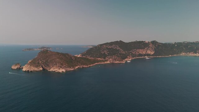 High Altitude Aerial View of Porto Timoni Peninsula and Twin Coves in Corfu Greece