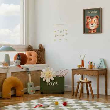 Modern and cozy children corner with handmade toys, kid-sized furniture, and a friendly tiger poster.