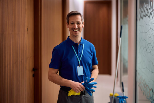Portrait of happy professional cleaner looking at camera.