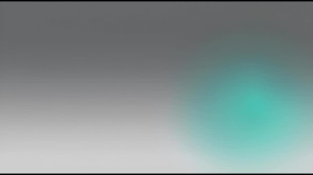 Soft, blurred turquoise glow with gradient fade on dark gray background, teal cyan