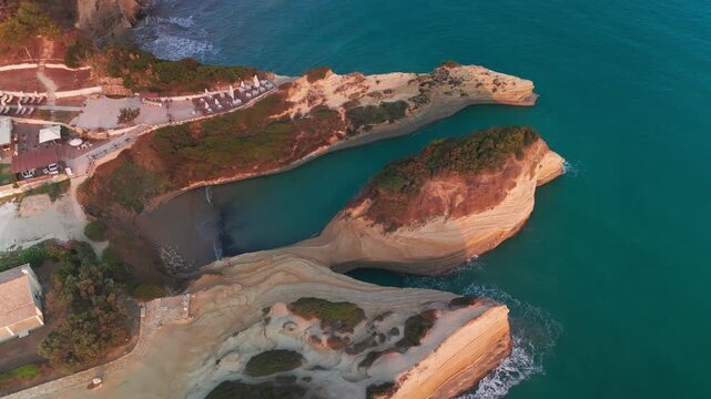 Drone Orbit Above Kanali tou Erota Sandstone Cliffs and Ionian Sea in Sidari Corfu