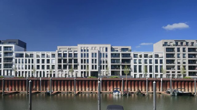 Dutch contemporary apartment buildings with small harbor in front in Zutphen, The Netherlands