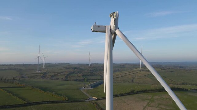 Broken blade hanging swinging from Wind Turbine in Ireland