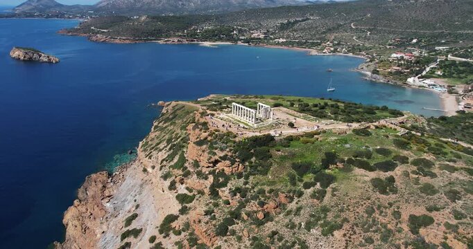 Aerial drone view of Temple of Poseidon at Cape Sounion at the edge of Attica, Greece