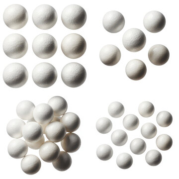 Collection of white polystyrene foam spheres arranged in various groups on a white background