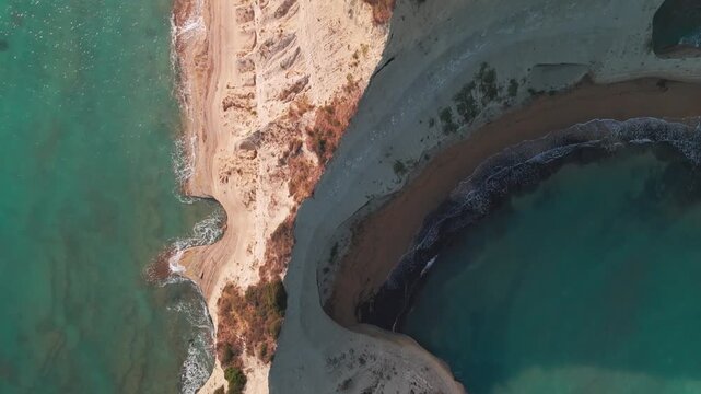 Bird's Eye View Drone Shot of Cape Drastis White Chalk Cliffs and Turquoise Ionian Sea in Greece