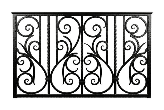 Wrought iron fence section with scrollwork isolated. Ornamental gate design.