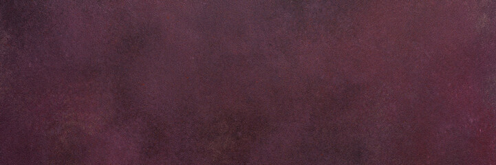 Fototapeta premium A dark maroon surface exhibits a subtle texture. Light and dark variations create a smooth, blended effect over the entire area, banner