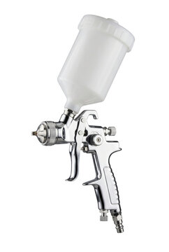 Professional paint spray gun with hopper isolated. Industrial pneumatic finishing tool.