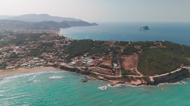Aerial Drone Flight Over Cape Kefali Peninsula Toward Arillas Bay Ionian Sea Coast Corfu Greece
