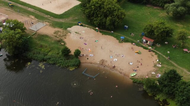 Drone zooming forward to Kolomna river beach
