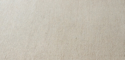 Fototapeta premium Beige fabric texture, close-up canvas