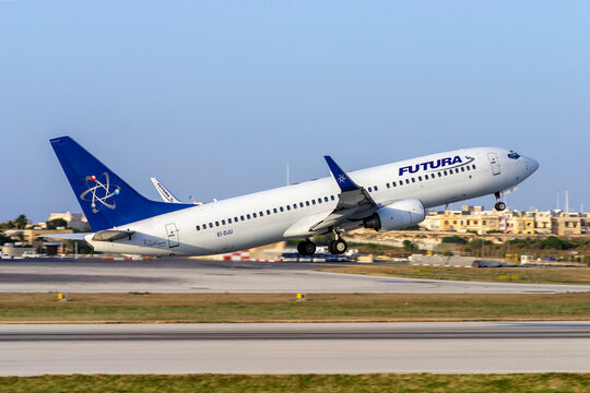 Luqa, Malta - May 26, 2007: Futura International Airways Boeing 737-86N (REG: EI-DJU) taking off runway 13 in the evening.