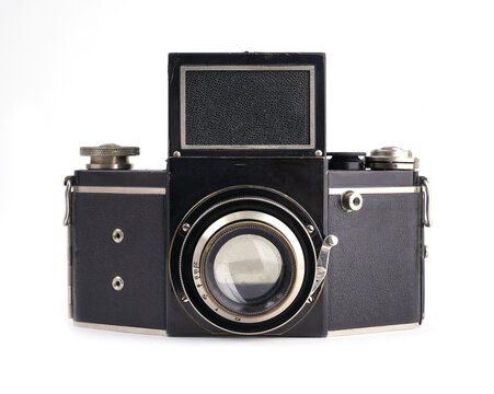 Vintage film camera isolated on white background