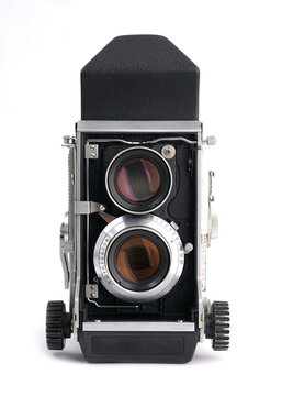 Vintage film camera isolated on white background