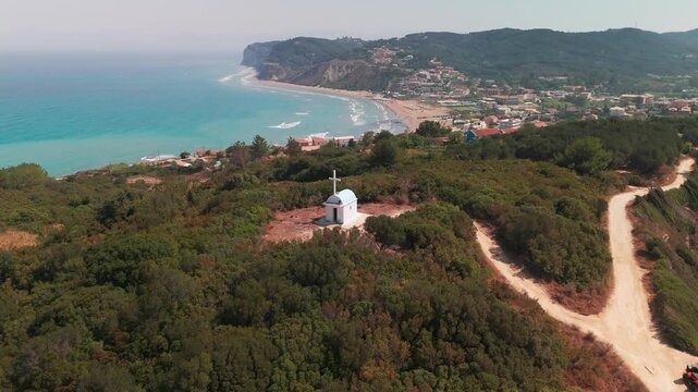 Drone Orbit of Historic Hilltop Chapel on Cape Kefali Cliffs in Corfu Greece