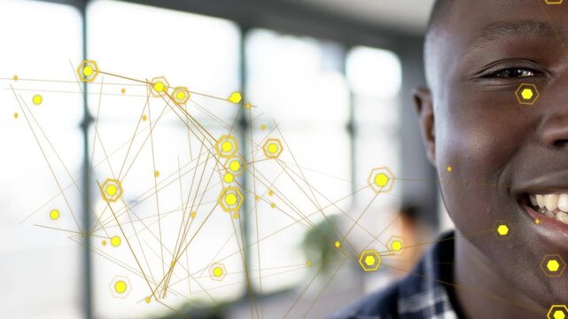 Yellow node network drifting, glowing, causing right man opening eyes and smiling, showing tech joy